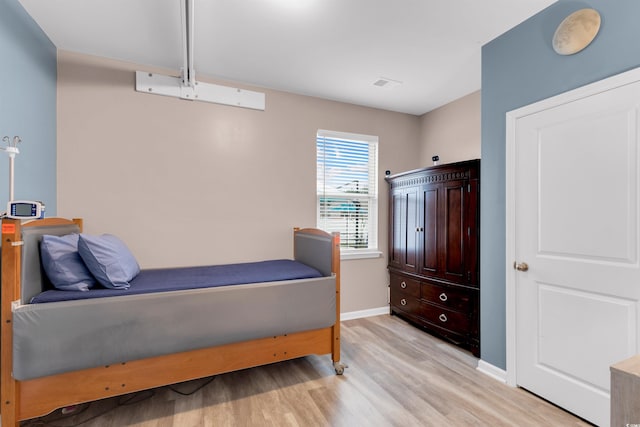 568 Affinity Dr, Myrtle Beach, SC 29588 - bedroom with light wood-style flooring and baseboards