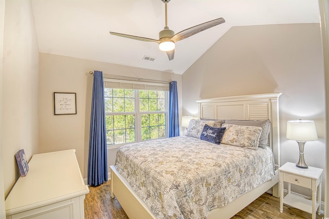 bedroom featuring wood-type flooring, ceiling fan, and lofted ceiling