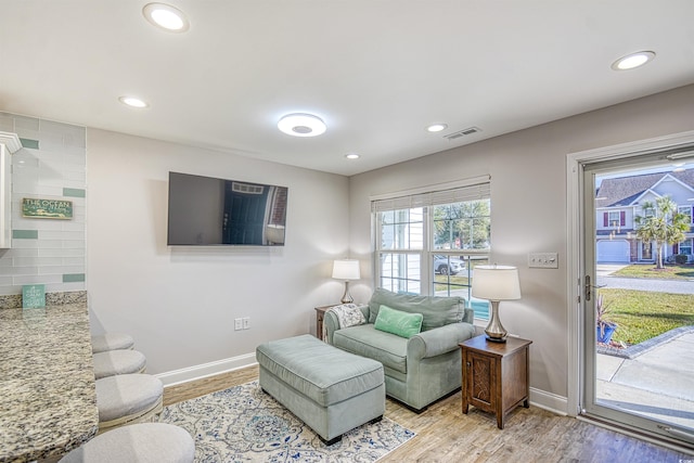 living room featuring light hardwood / wood-style flooring