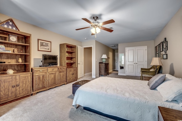 carpeted bedroom with ceiling fan