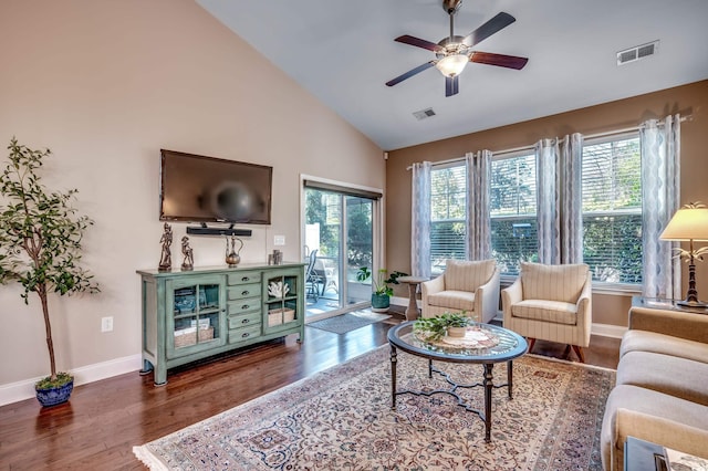 living room featuring ceiling fan, high vaulted ceiling, and dark hardwood / wood-style flooring