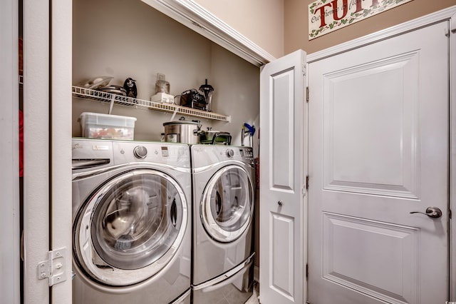 laundry room featuring independent washer and dryer