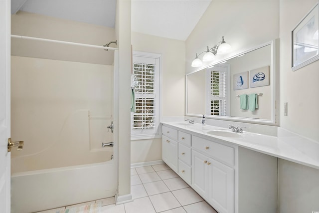 bathroom with vanity, shower / tub combination, and tile patterned floors