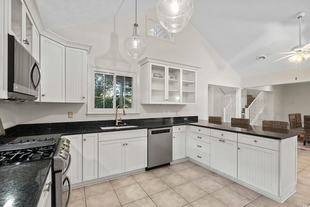 kitchen with white cabinetry, sink, and stainless steel appliances