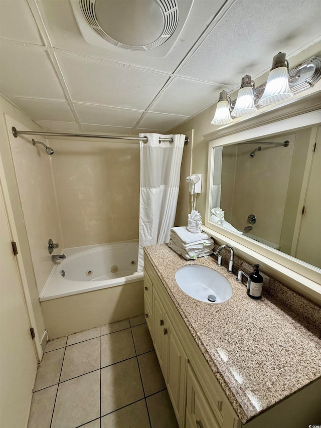 bathroom with tile patterned flooring, vanity, and shower / tub combo with curtain