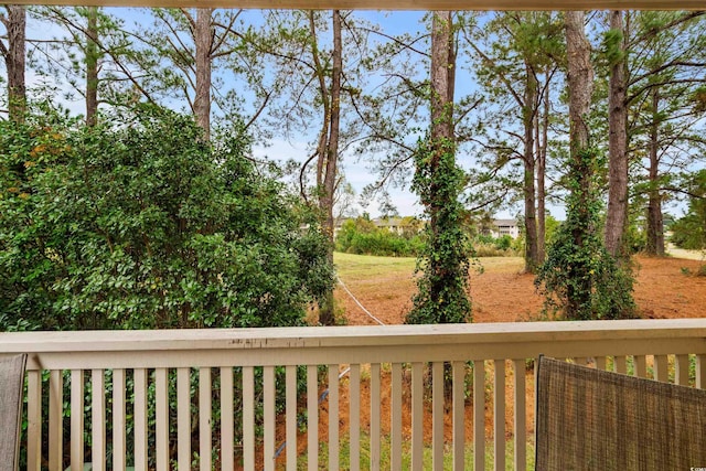 view of yard featuring a balcony