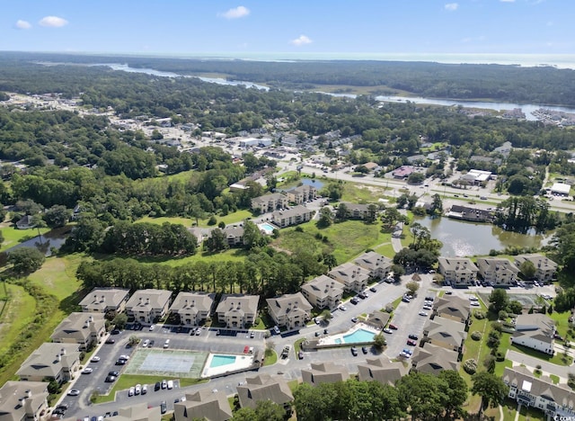 drone / aerial view with a water view