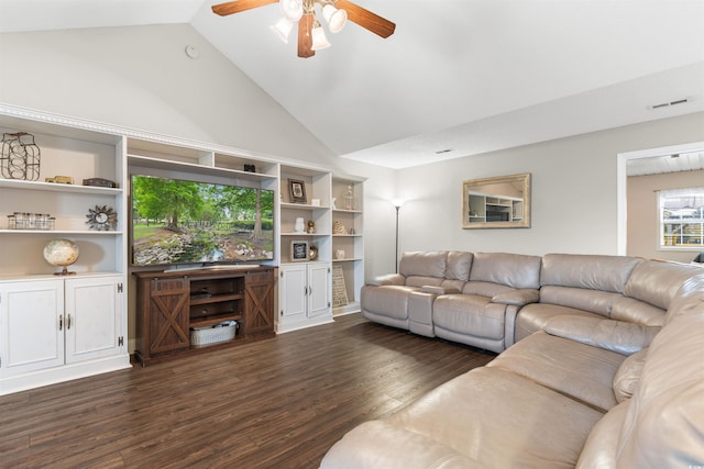 living area featuring high vaulted ceiling, visible vents, dark wood finished floors, and ceiling fan