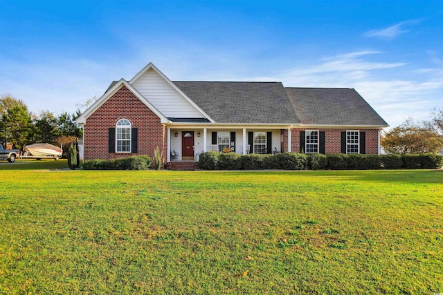 view of front of home with a front lawn and covered porch