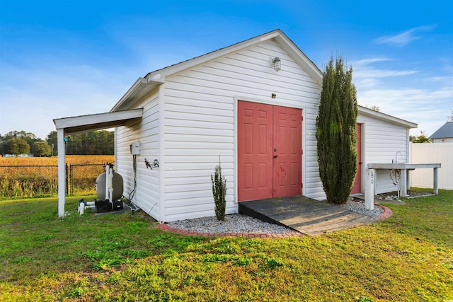 view of shed with fence