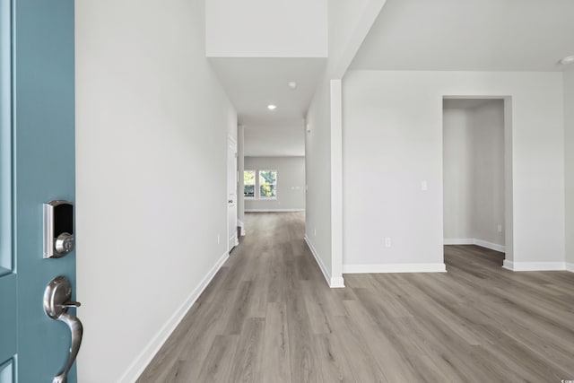 corridor featuring light hardwood / wood-style floors