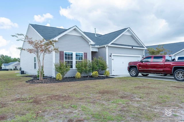 ranch-style home featuring a front yard and a garage