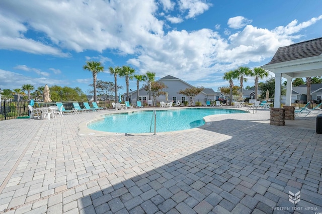 view of swimming pool featuring a patio