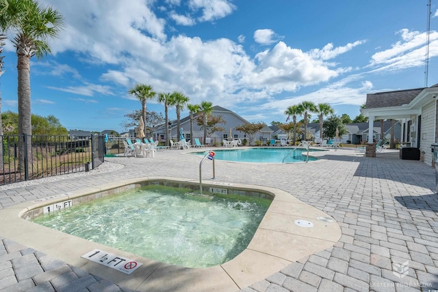 view of swimming pool featuring a patio