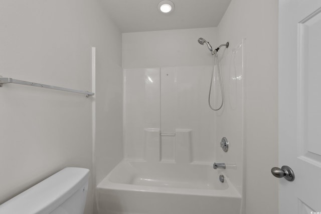 bathroom featuring toilet and shower / bath combination