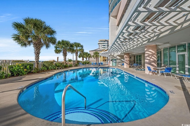 view of swimming pool featuring a patio