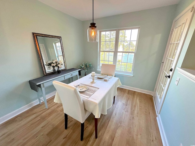 dining space featuring light hardwood / wood-style floors