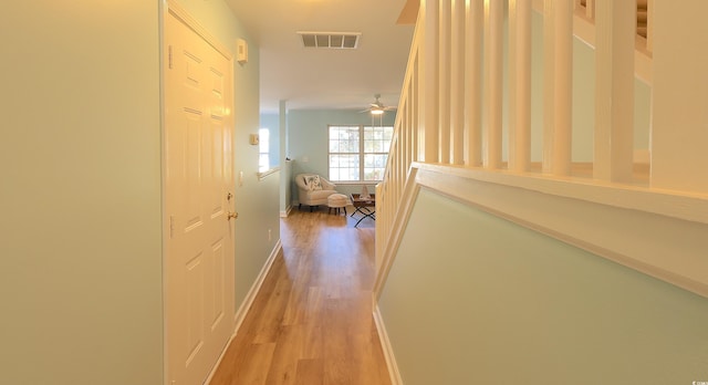 hall featuring light hardwood / wood-style flooring