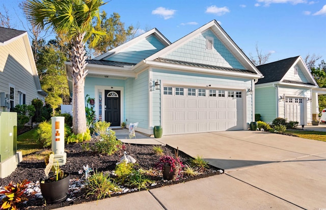 view of front of property with a garage