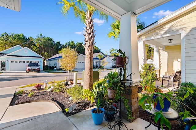 view of patio featuring a garage