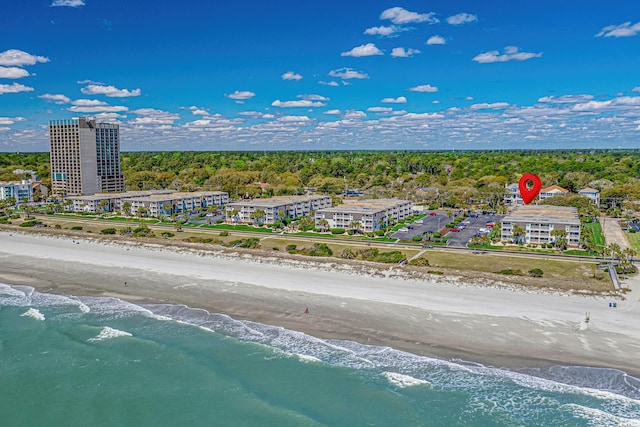 drone / aerial view featuring a view of the beach and a water view