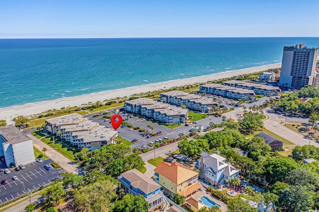 bird's eye view with a view of the beach and a water view