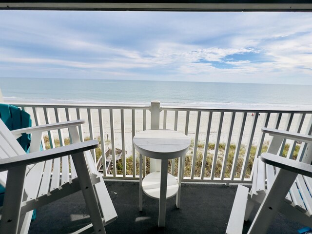 view of water feature with a beach view