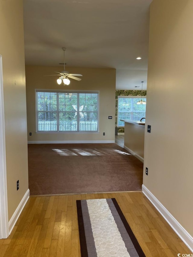 323 Sea Turtle Dr, Myrtle Beach, SC 29588 - hall with hardwood / wood-style floors, baseboards, and recessed lighting