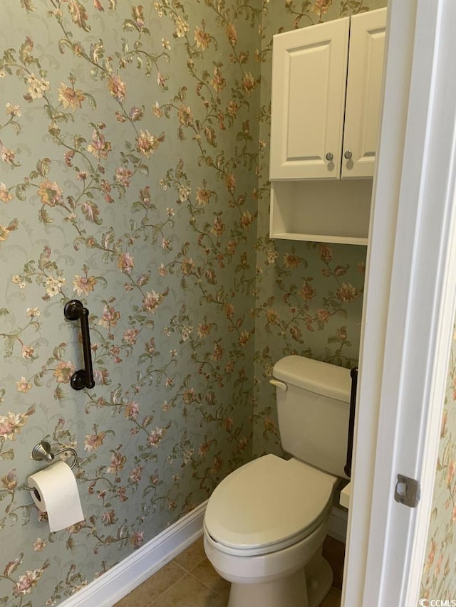 323 Sea Turtle Dr, Myrtle Beach, SC 29588 - bathroom with baseboards, tile patterned floors, and toilet