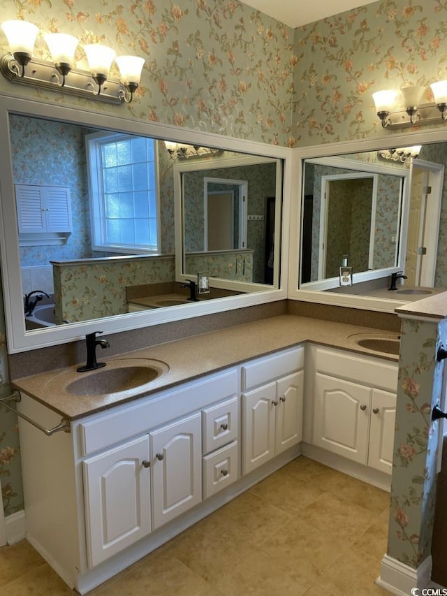 323 Sea Turtle Dr, Myrtle Beach, SC 29588 - bathroom with double vanity, tile patterned floors, and wallpapered walls