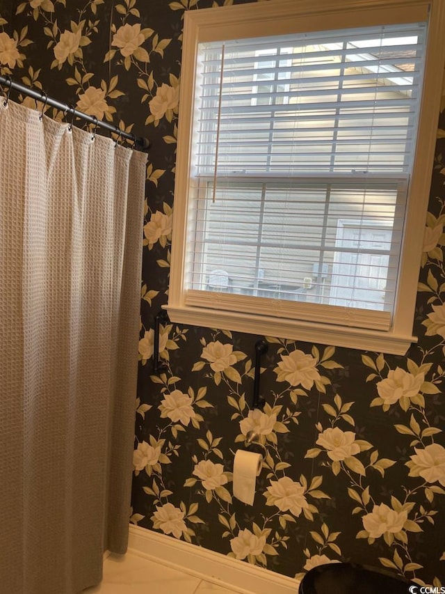 323 Sea Turtle Dr, Myrtle Beach, SC 29588 - bathroom with wallpapered walls and baseboards