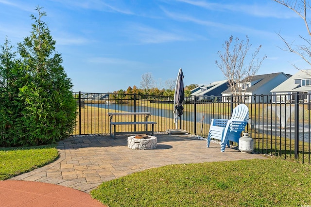 338 Harbour View Dr, Myrtle Beach, SC 29579 - view of patio / terrace featuring an outdoor fire pit, a water view, and a residential view