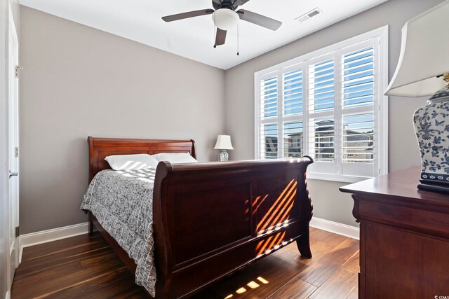 338 Harbour View Dr, Myrtle Beach, SC 29579 - bedroom featuring baseboards, wood finished floors, and a ceiling fan