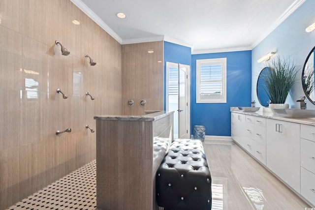 338 Harbour View Dr, Myrtle Beach, SC 29579 - bathroom featuring a walk in shower, ornamental molding, double vanity, wood finished floors, and baseboards