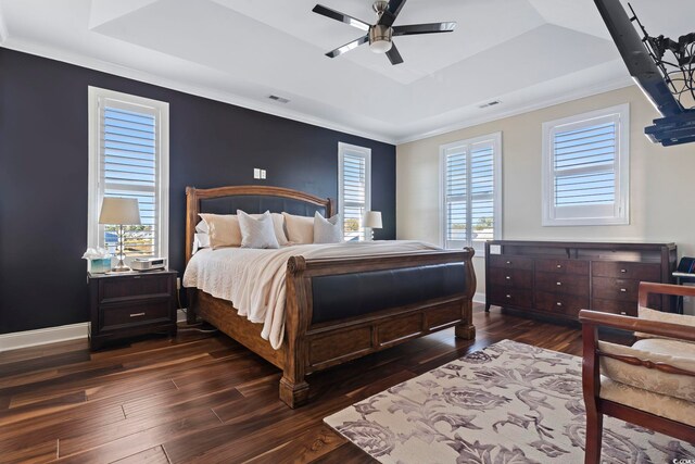 338 Harbour View Dr, Myrtle Beach, SC 29579 - bedroom featuring a raised ceiling, wood-type flooring, crown molding, baseboards, and ceiling fan