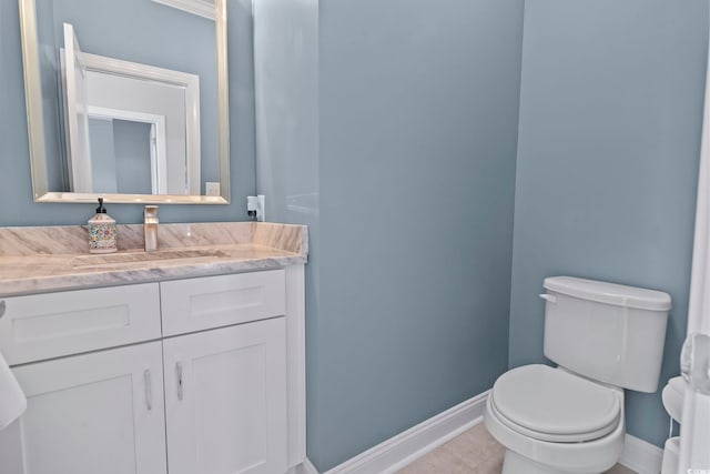 338 Harbour View Dr, Myrtle Beach, SC 29579 - bathroom with baseboards, toilet, and vanity