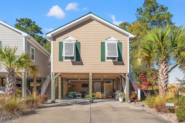 view of front of house featuring a carport