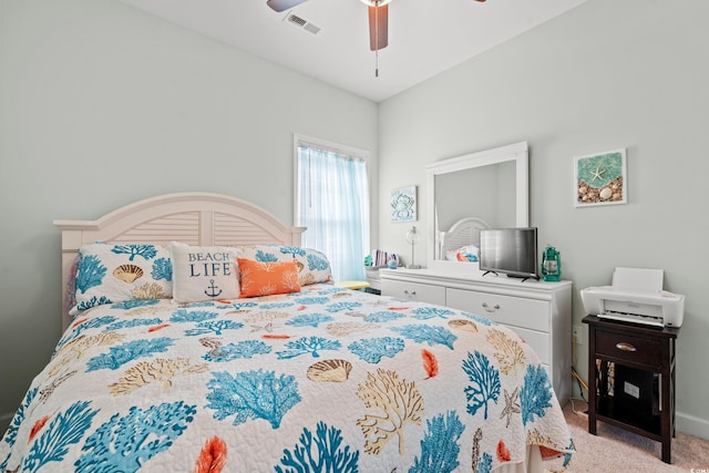 carpeted bedroom with ceiling fan