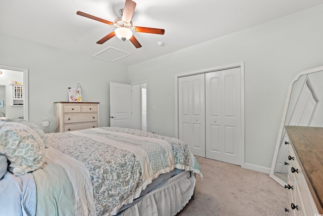 bedroom featuring light carpet, a closet, and ceiling fan