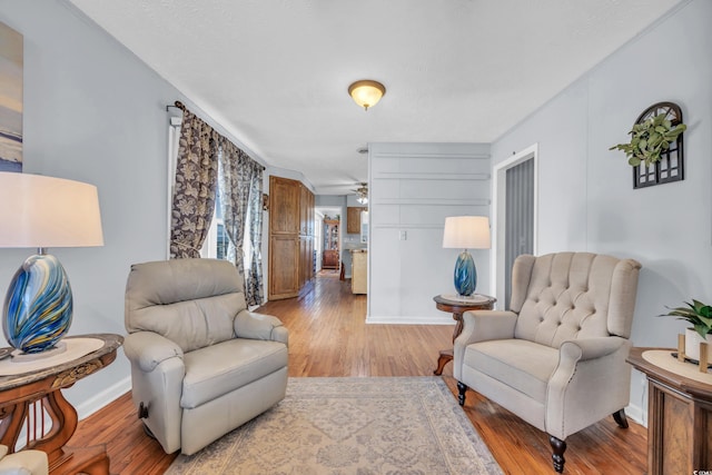 310 34th Ave N, North Myrtle Beach, SC 29582 - sitting room with light wood-style flooring and baseboards