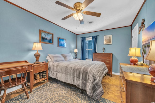 bedroom with ceiling fan, ornamental molding, a textured ceiling, and parquet flooring