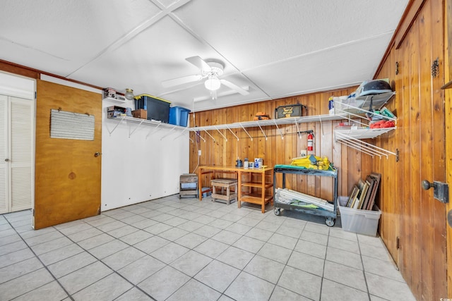 interior space featuring ceiling fan