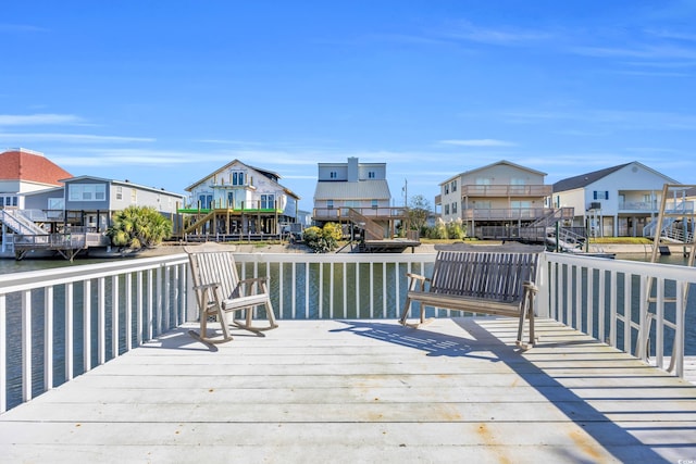 deck featuring a water view