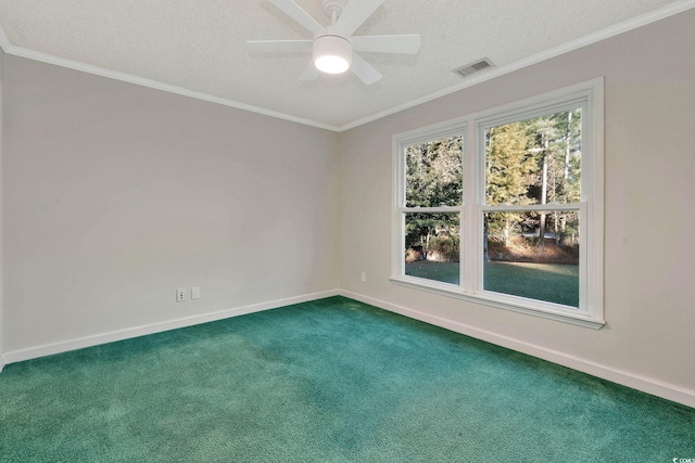 spare room with carpet flooring, ceiling fan, and ornamental molding