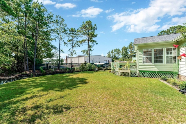 view of yard featuring a deck