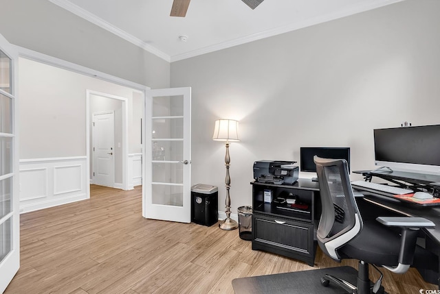 home office featuring ceiling fan, light hardwood / wood-style floors, crown molding, and french doors