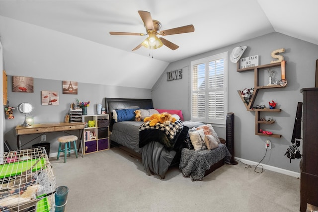 carpeted bedroom featuring ceiling fan and lofted ceiling