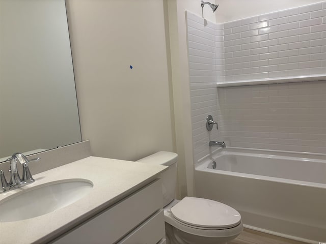 full bathroom with vanity, bathing tub / shower combination, wood-type flooring, and toilet