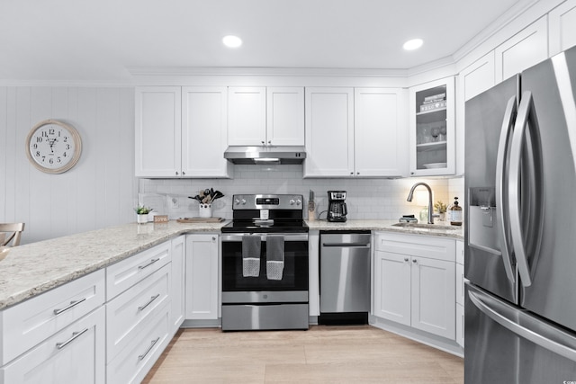 kitchen featuring white cabinetry, sink, and appliances with stainless steel finishes