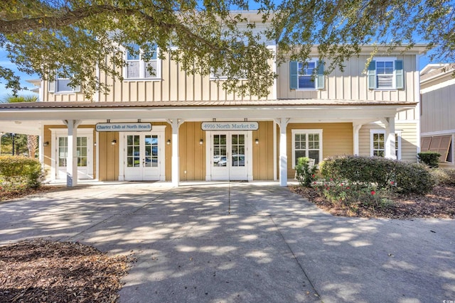 townhome / multi-family property featuring french doors